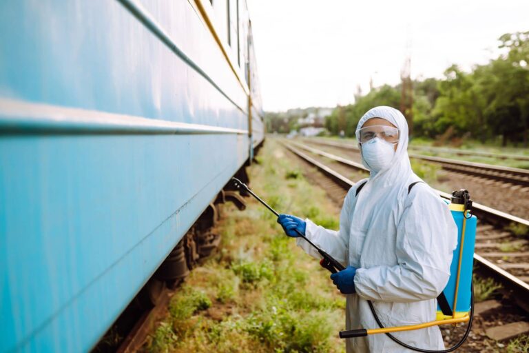 man-in-protective-suit-disinfects-a-train-young-m-2023-11-27-05-15-34-utc (1)